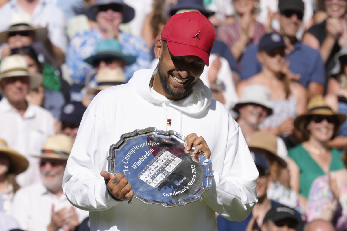 Nick Kyrgios with runner-up trophy at Wimbledon.